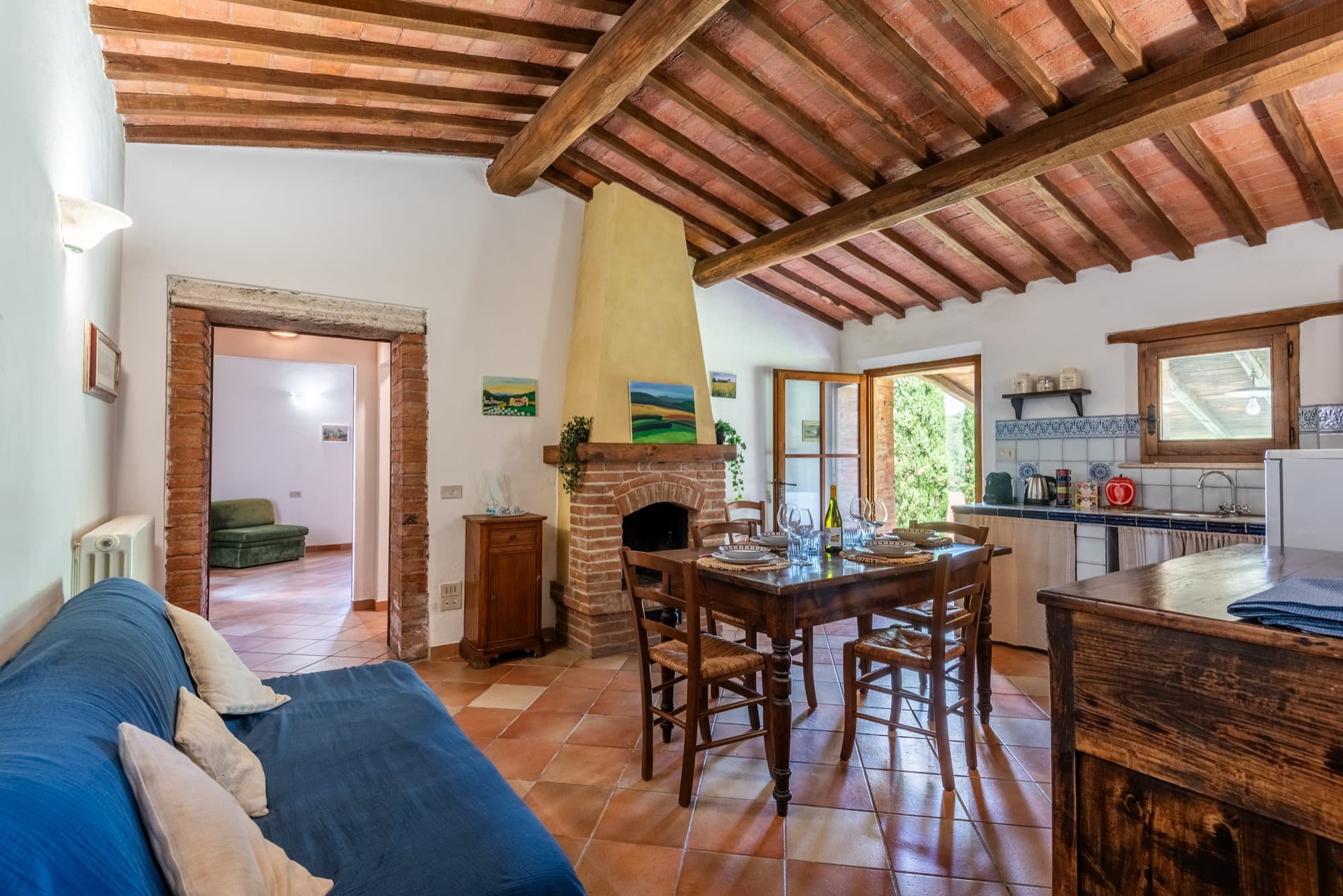 Appartamento Camugnano — salotto con camino